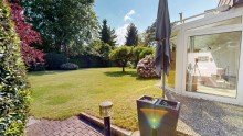 Blick von der �berdachten Terrasse Charmante Doppelhaush�lfte mit S�dgarten, Wintergarten, PV-Anlage und moderner Heiztechnik